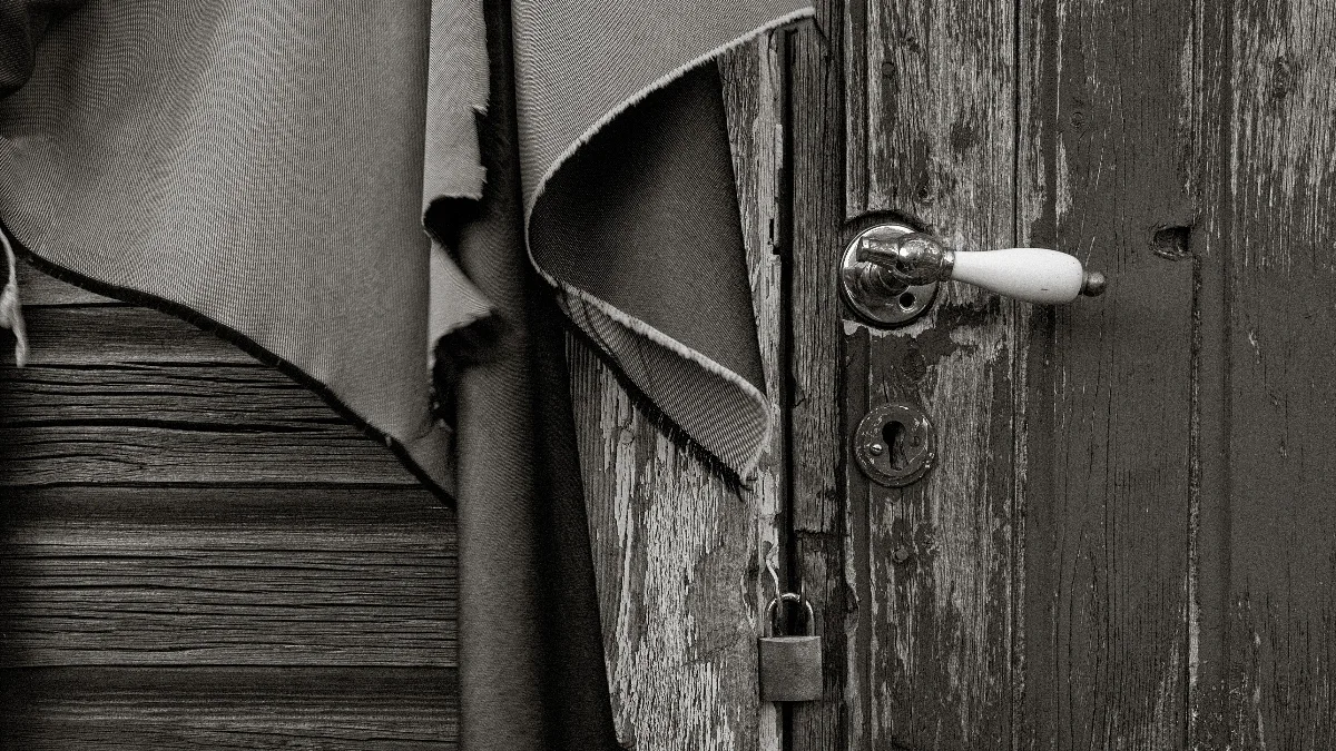 Close-up of an old doorhandle on the fishing hut