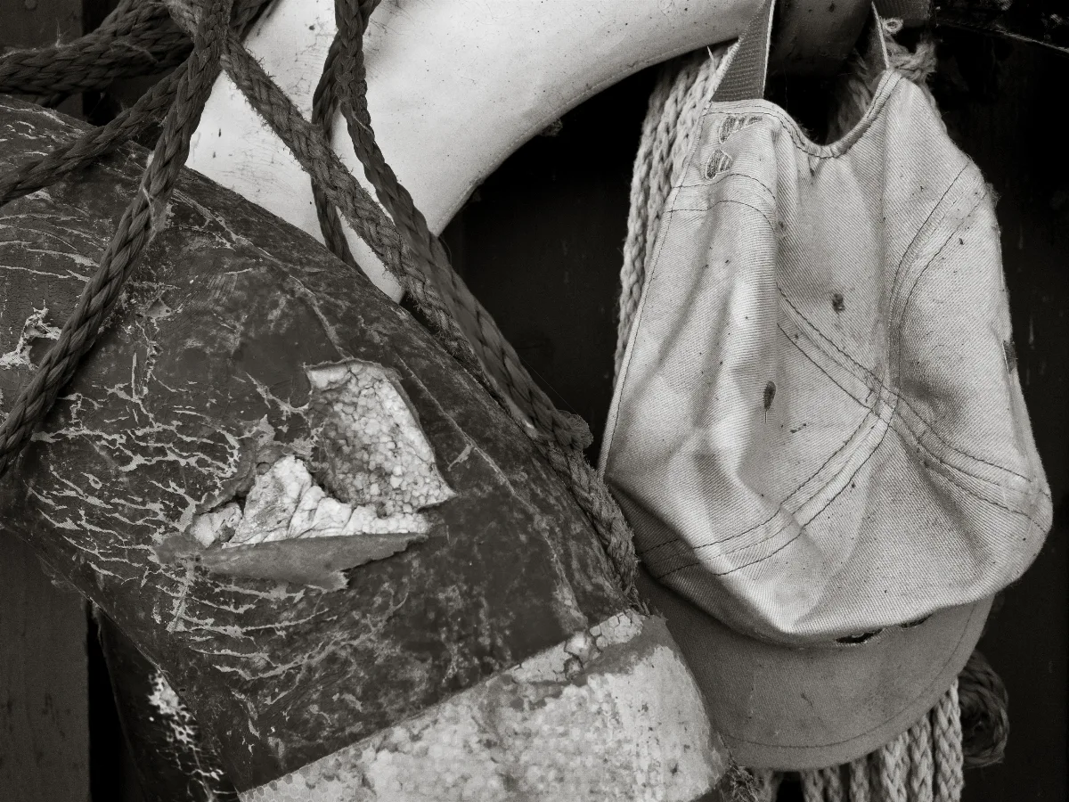 Another old cap and a life-buoy in close-up