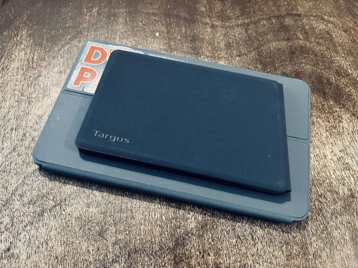 The folded keyboard on top of the Lenovo tablet